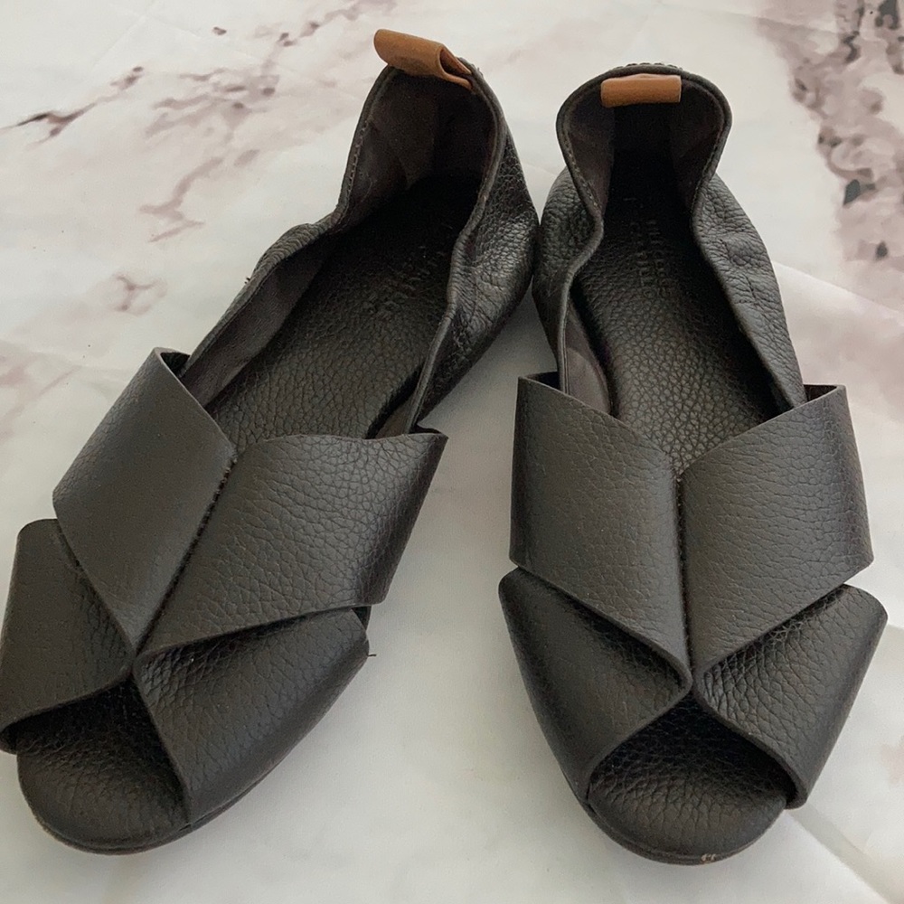 Dark brown Amalia flats by Mercedes Castillo.
